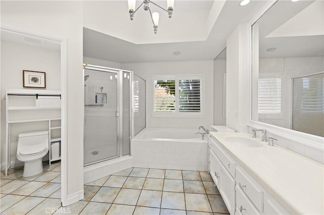 full bathroom featuring a garden tub, a shower stall, vanity, and tile patterned floors