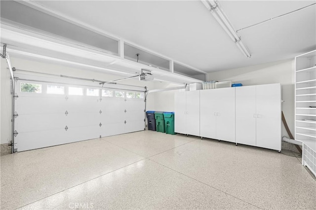 6 Baristo Unit 39, Irvine, CA 92612 - garage featuring a garage door opener