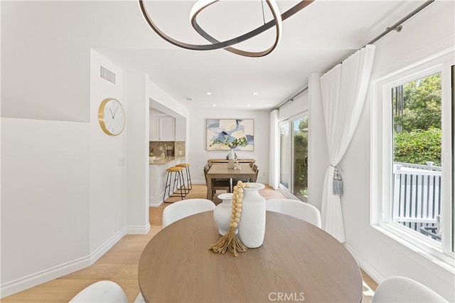 6 Baristo Unit 39, Irvine, CA 92612 - dining area with plenty of natural light, light wood finished floors, baseboards, and recessed lighting