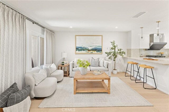 6 Baristo Unit 39, Irvine, CA 92612 - living room with recessed lighting and light wood-type flooring