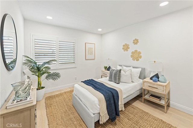 6 Baristo Unit 39, Irvine, CA 92612 - bedroom with recessed lighting, light wood-style floors, and baseboards