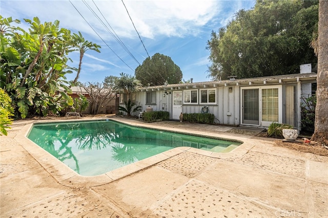 pool with a patio area