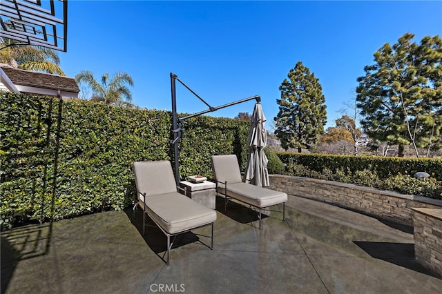 view of patio / terrace with fence