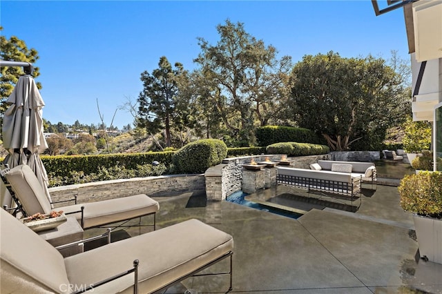 view of patio / terrace with an outdoor hangout area
