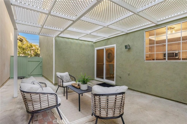 view of patio featuring a gate and an outdoor hangout area