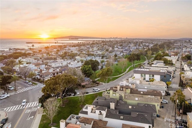 bird's eye view with a residential view and a water view