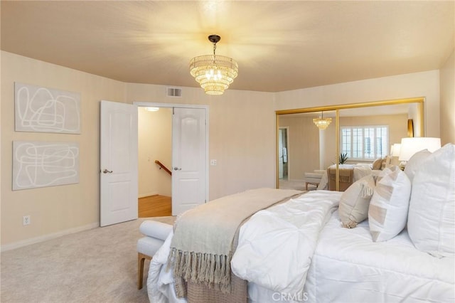 bedroom featuring a chandelier, carpet flooring, visible vents, baseboards, and a closet