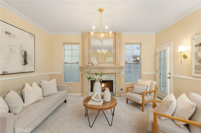 living room with a chandelier, a high end fireplace, light colored carpet, and crown molding