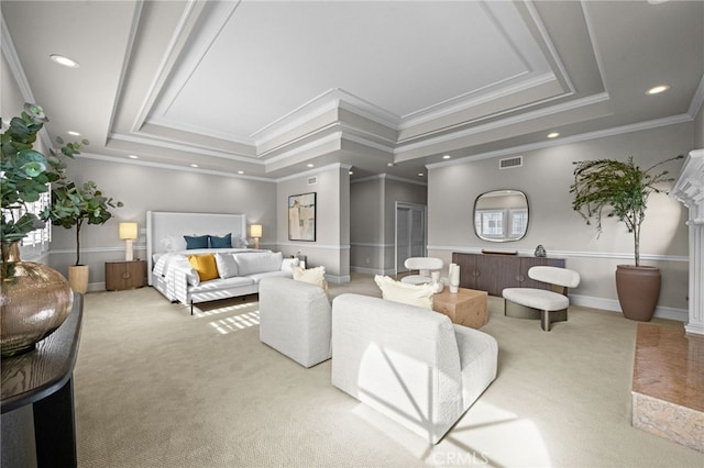 bedroom featuring a tray ceiling, recessed lighting, visible vents, and light carpet