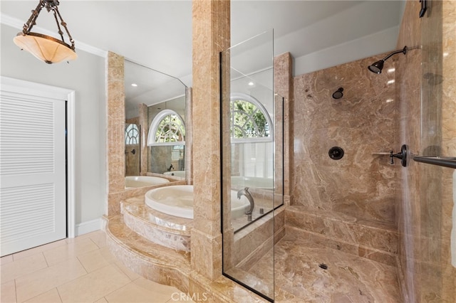 full bathroom with a bath, tile patterned floors, and a walk in shower