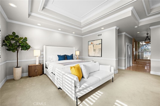 carpeted bedroom featuring a tray ceiling, visible vents, ornamental molding, and recessed lighting