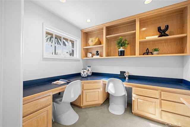 office area featuring recessed lighting, light colored carpet, and built in desk