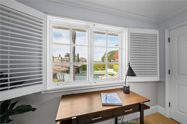 office with baseboards and crown molding