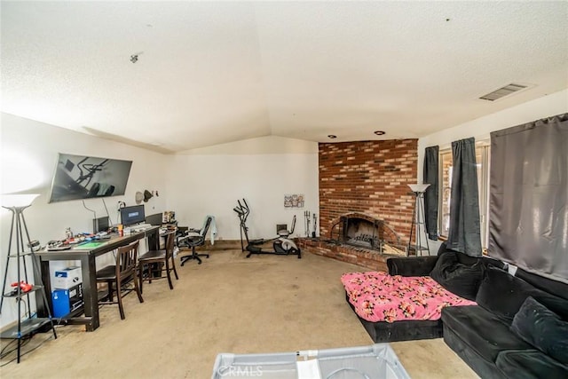 interior space with visible vents, lofted ceiling, carpet, a textured ceiling, and a brick fireplace