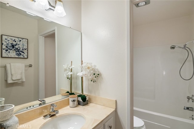 full bathroom featuring shower / bathtub combination, toilet, and vanity