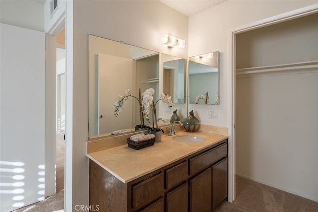 bathroom featuring visible vents and vanity