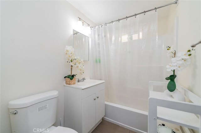 bathroom featuring shower / bath combo, vanity, and toilet