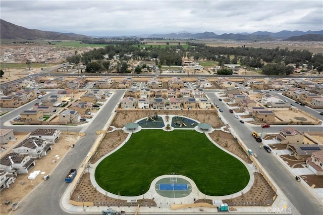 birds eye view of property with a residential view and a mountain view