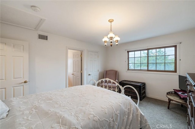 carpeted bedroom with baseboards, visible vents, and a chandelier