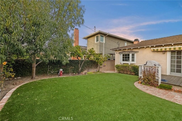 view of yard with fence