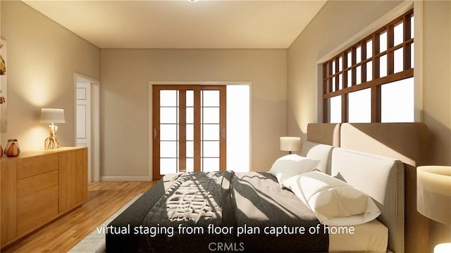 bedroom with light wood-style flooring and baseboards