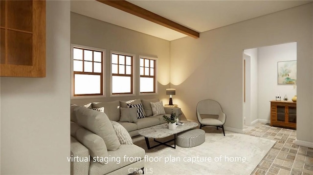 living area with beamed ceiling and baseboards