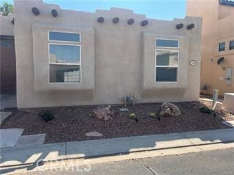 exterior space with stucco siding