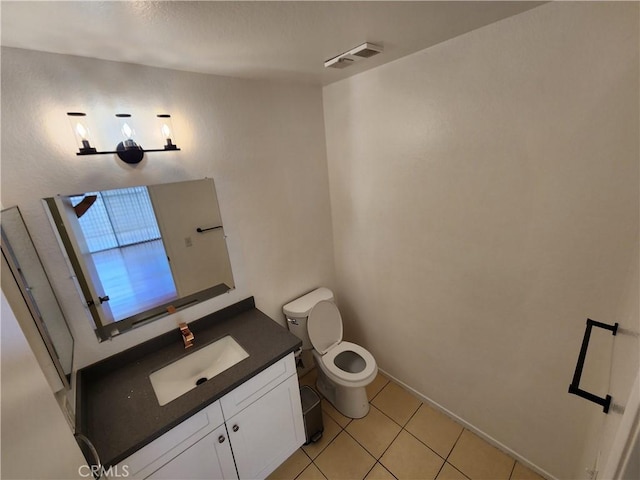 bathroom featuring toilet, tile patterned flooring, visible vents, and vanity