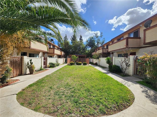 view of yard with a fenced front yard