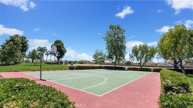 view of sport court with community basketball court and a lawn