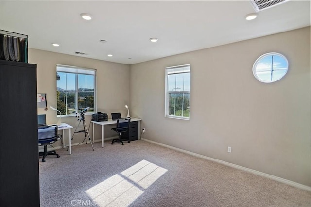 carpeted home office with recessed lighting, visible vents, and baseboards