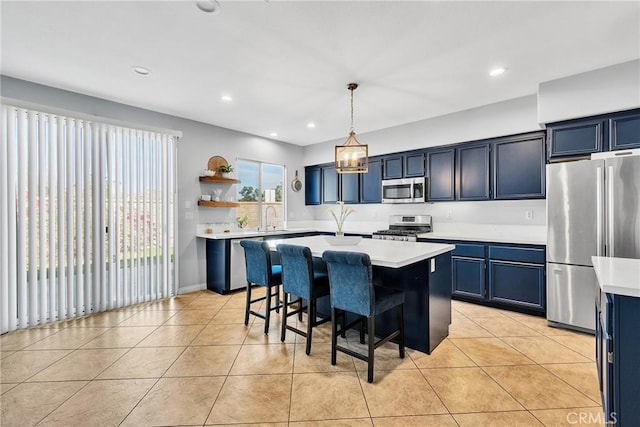 kitchen with light tile patterned floors, stainless steel appliances, light countertops, open shelves, and a sink