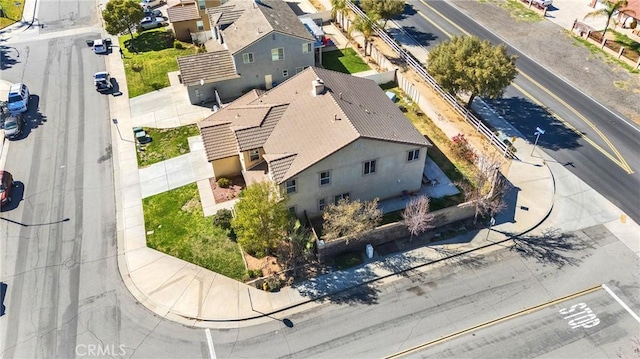 birds eye view of property with a residential view