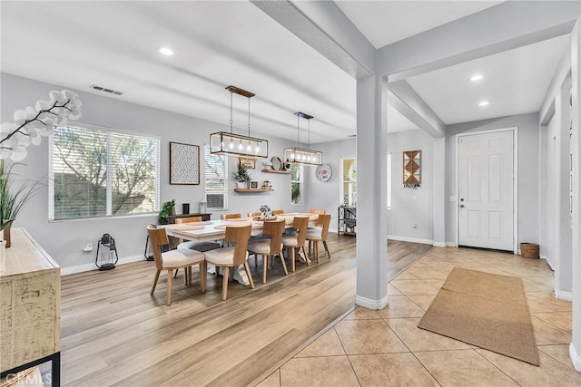 dining space featuring light wood finished floors, recessed lighting, visible vents, and baseboards