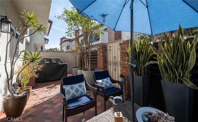 view of patio / terrace featuring a fenced backyard and grilling area