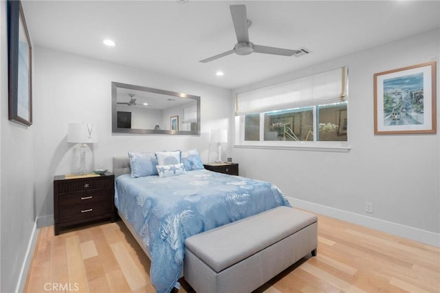 bedroom with recessed lighting, baseboards, and wood finished floors