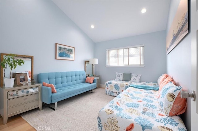 bedroom featuring vaulted ceiling, recessed lighting, and baseboards