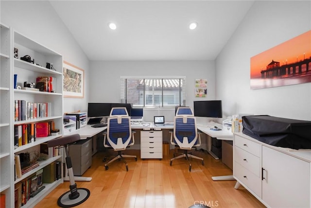 office featuring recessed lighting, light wood-style flooring, and vaulted ceiling