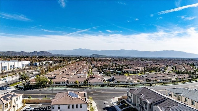 bird's eye view with a residential view and a mountain view