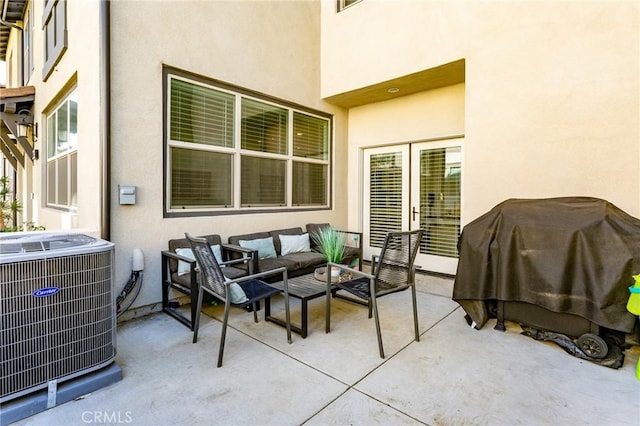 view of patio with an outdoor hangout area and central AC