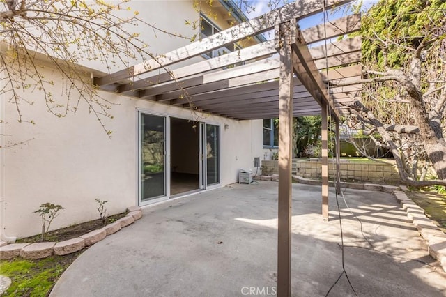 view of patio / terrace featuring fence and a pergola