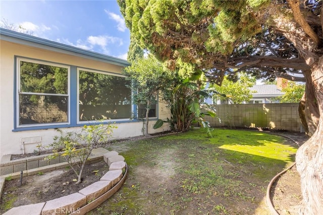 view of yard with fence