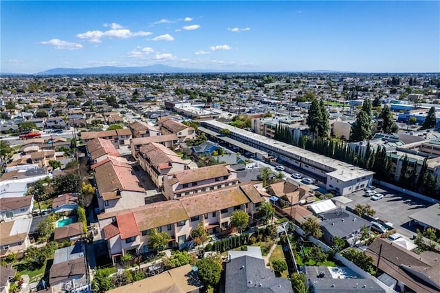 birds eye view of property featuring a mountain view