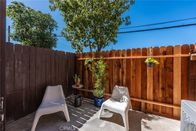 view of patio with fence