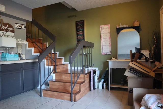 stairs with tile patterned flooring and indoor bar