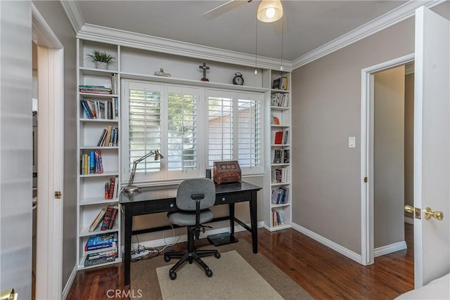 office area with built in features, baseboards, a ceiling fan, wood finished floors, and crown molding