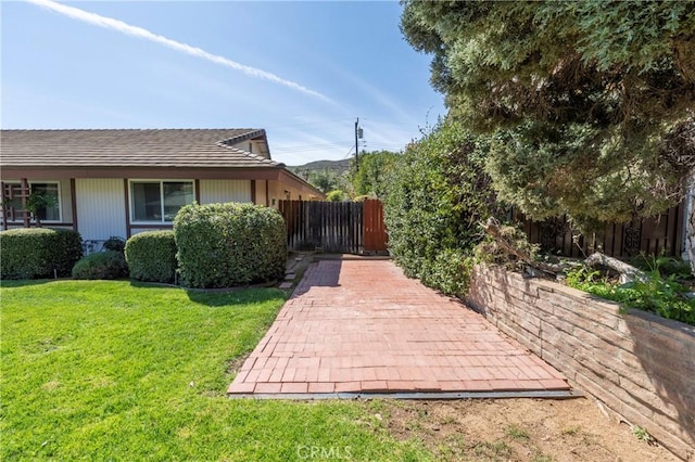 view of yard featuring fence