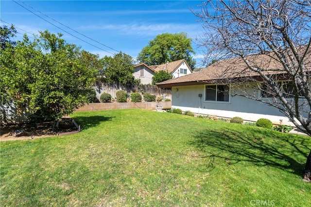 view of yard with fence