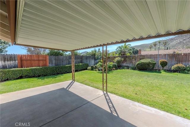 view of patio with a fenced backyard