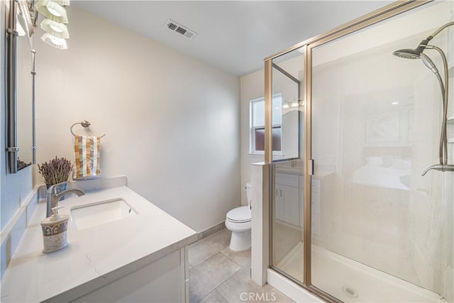 full bathroom featuring toilet, a shower stall, visible vents, and vanity